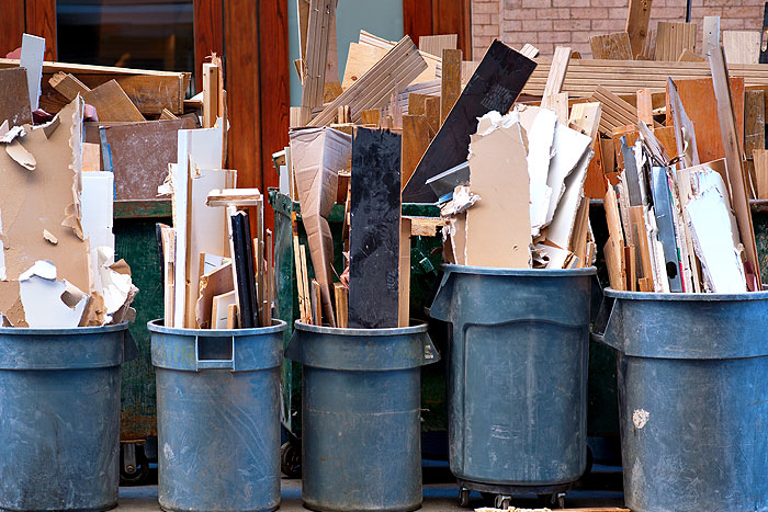 construction debris in garbage bins for junk removal collection in edmonton